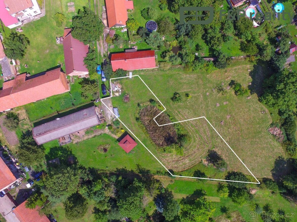 Prodej stavebního pozemku 1103m2, Skochovice