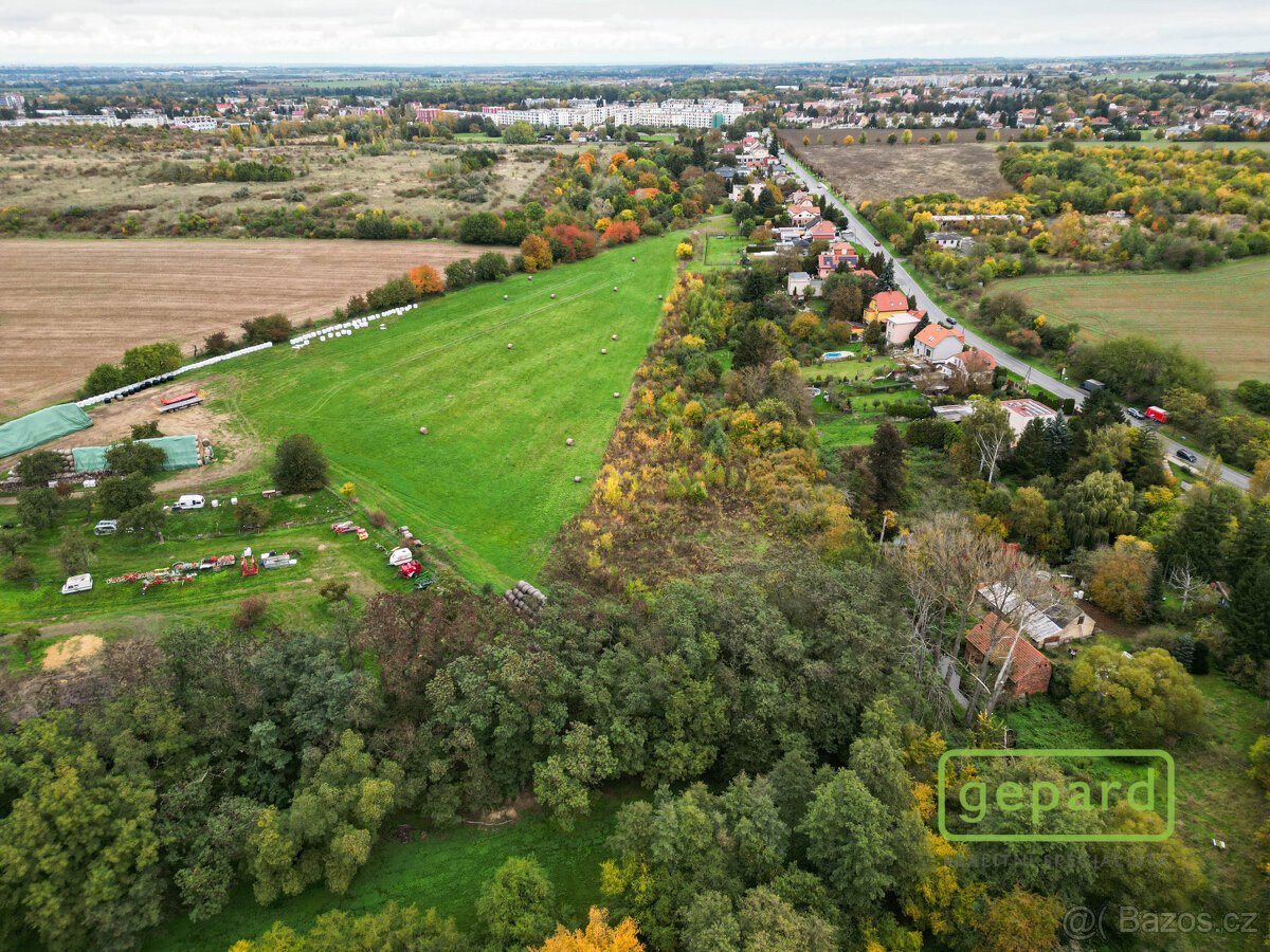Soubor pozemků o výměře 12 706 m2, včetně potoka a RD k reko