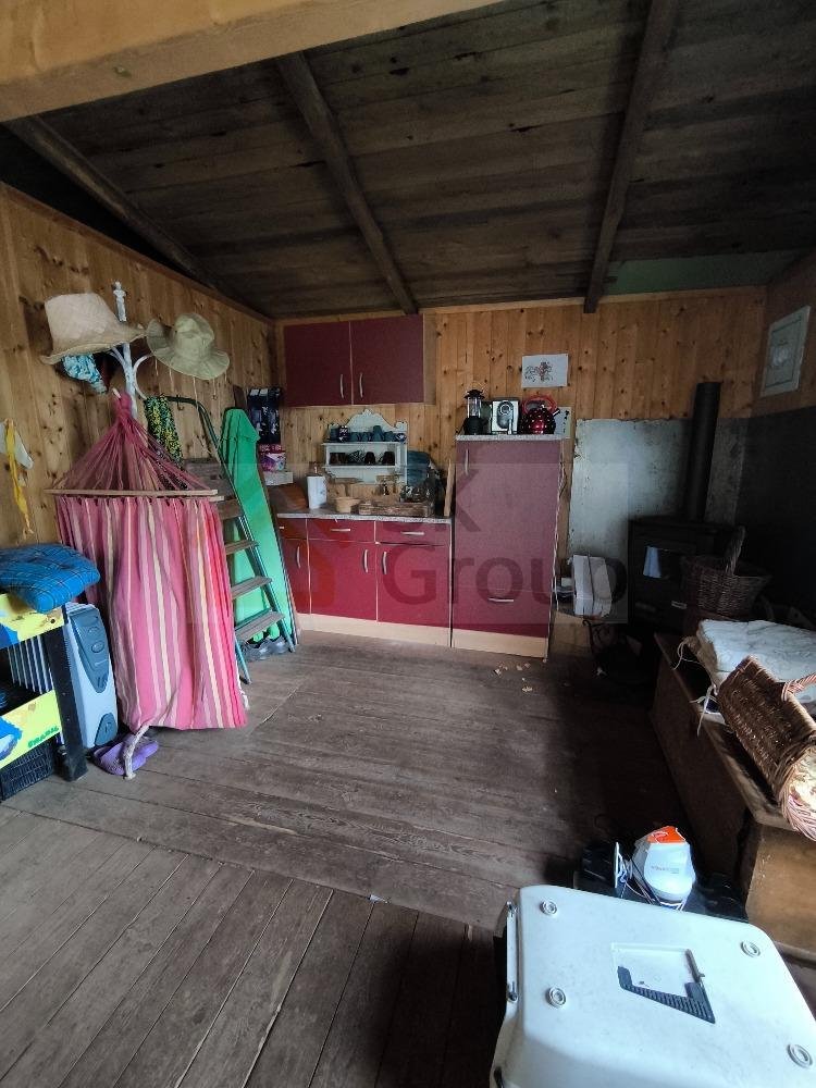 Prodej zahrady 569 m2 včetně dřevěné chaty