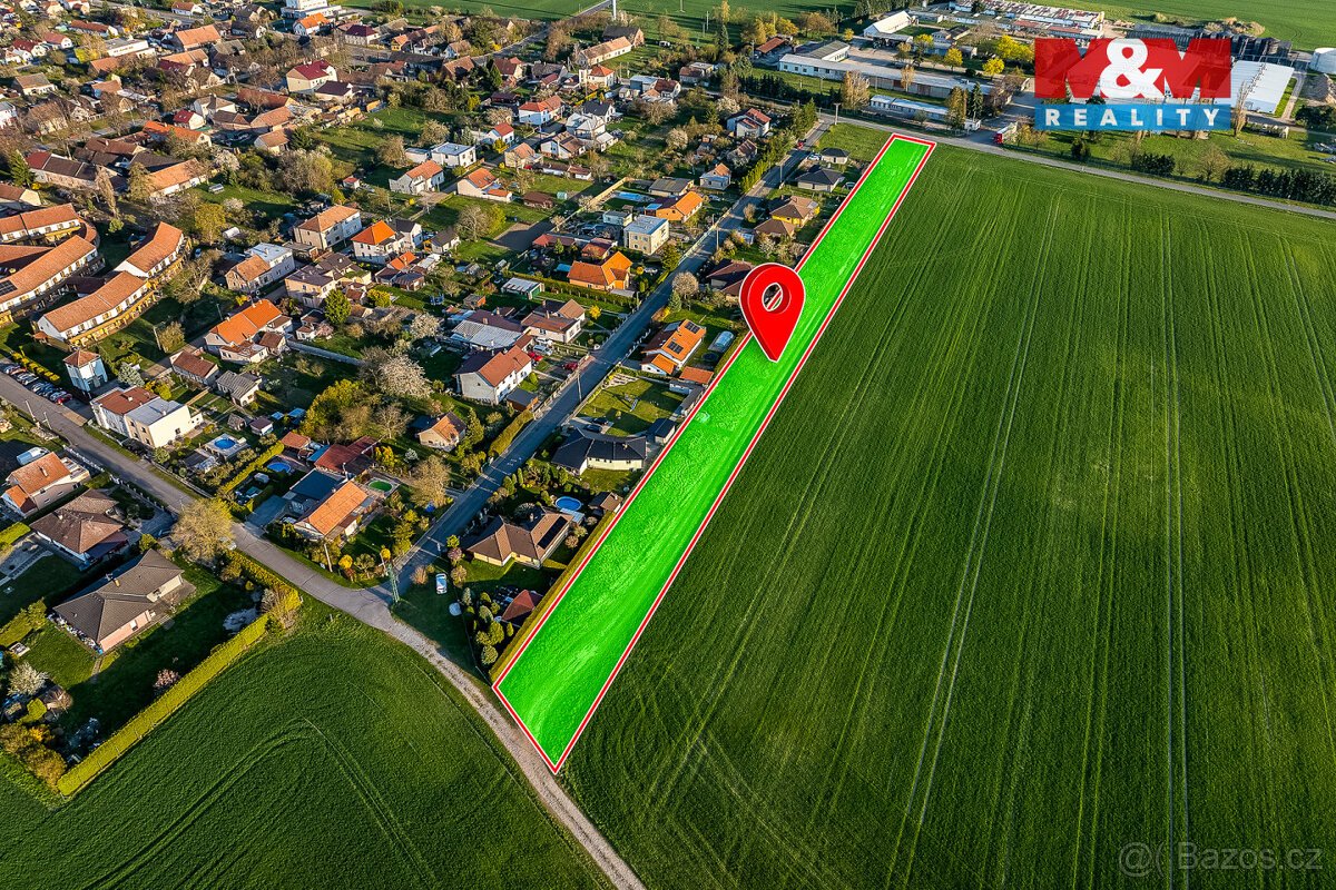 Prodej podílu ½ pozemku k bydlení, Moravany