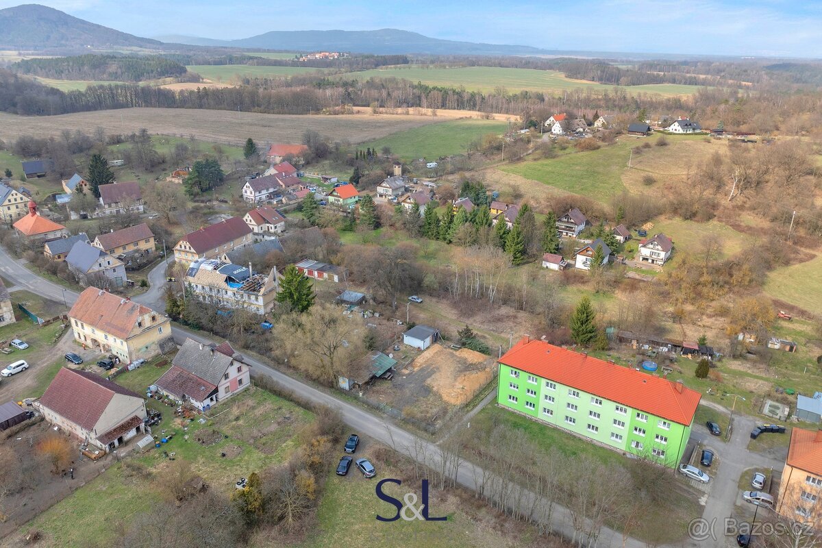 Prodej stavebního pozemku 1 026 m², Dubá - Dřevčice