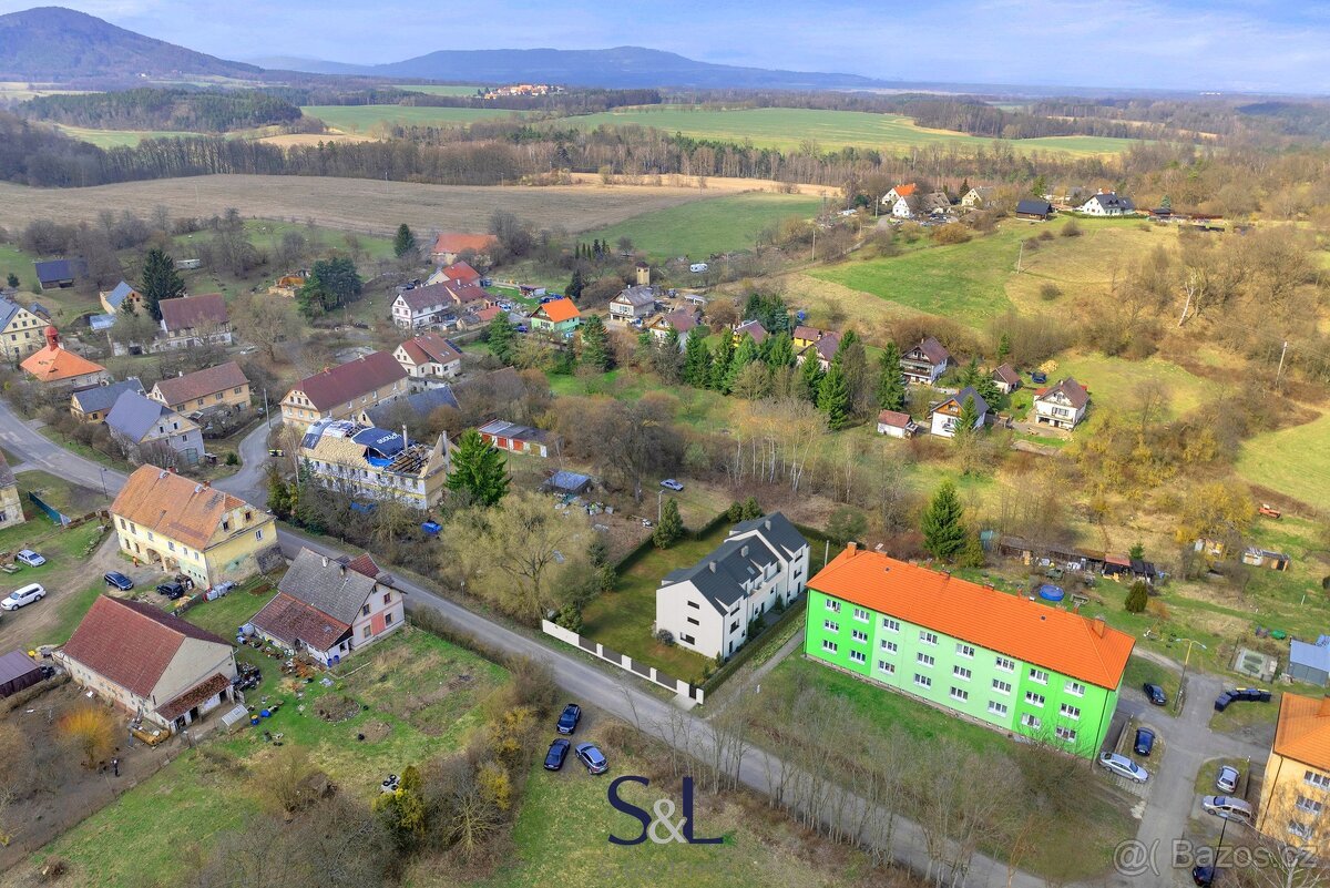 Prodej stavebního pozemku 1 026 m², Dubá - Dřevčice