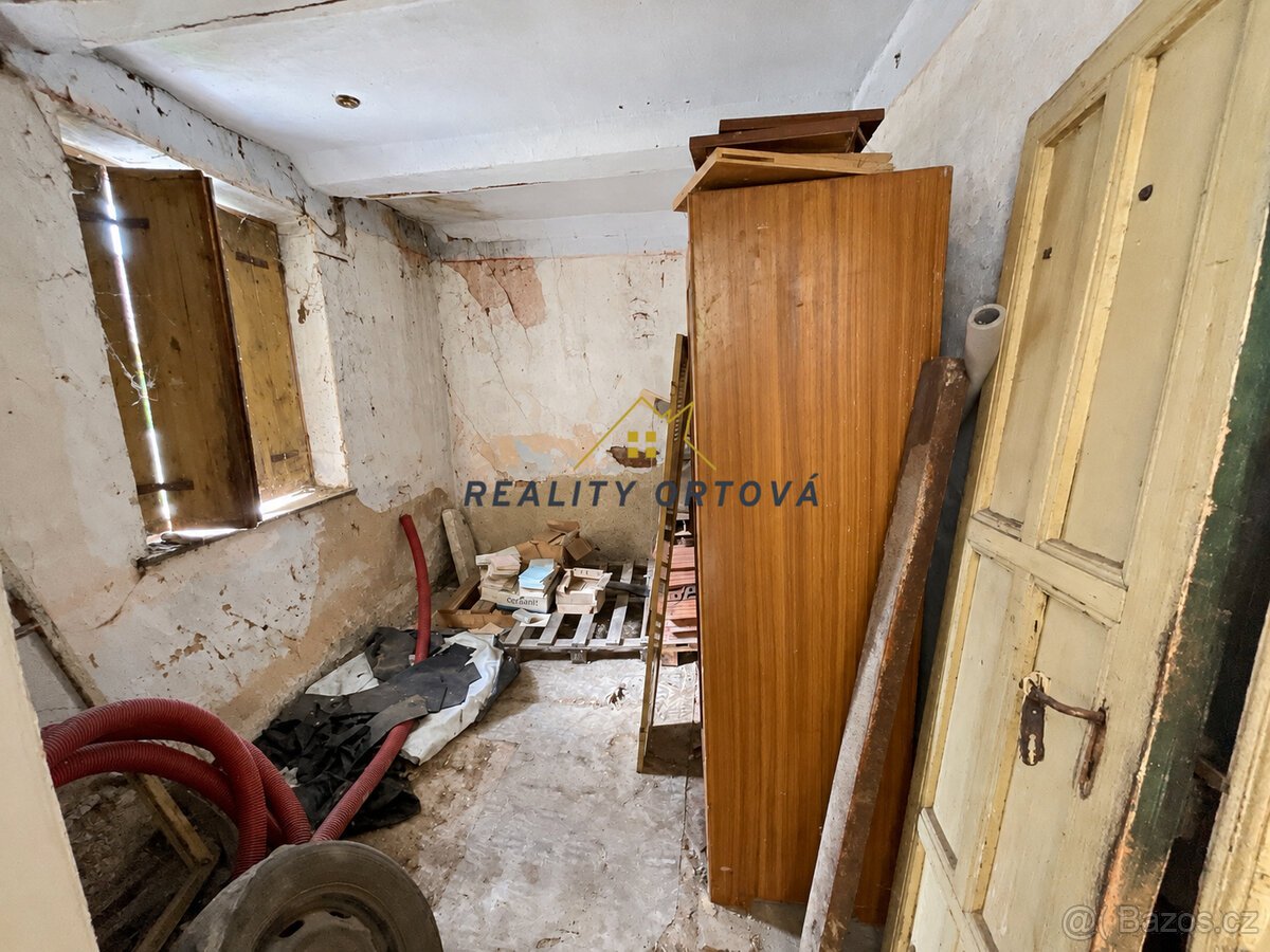 Dům s velkou stodolou a oploceným pozemkem 782 m² – Ohnišťan